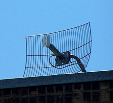 A microwave antenna linking a local computer with an MMDS wireless access point