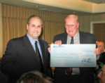 Martin Lynch (L) presenting Neville, G3NUG with a cheque for the Five Star DXers Association