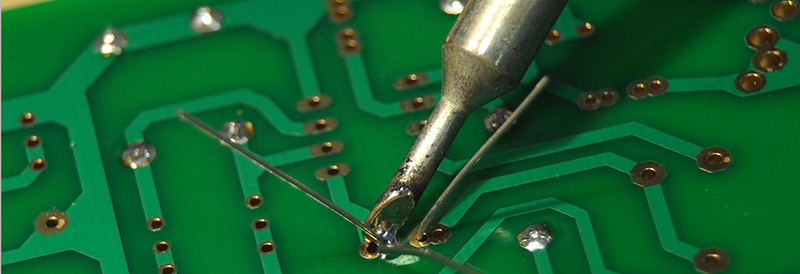 Soldering iron on circuit board