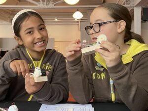 ARISS-contact-5-October-two-brownies-making-Snail-Morse-keys-photo-credit-the-Radio-Society-of-Great-Britain