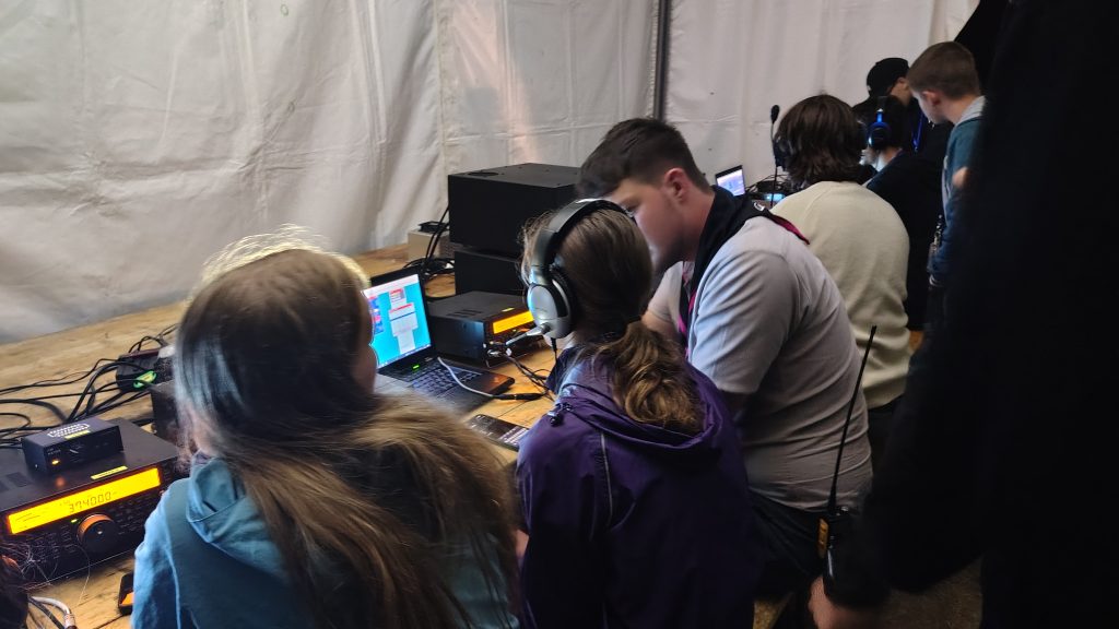 Sam helping Sophie and Emily with their first HF QSOs